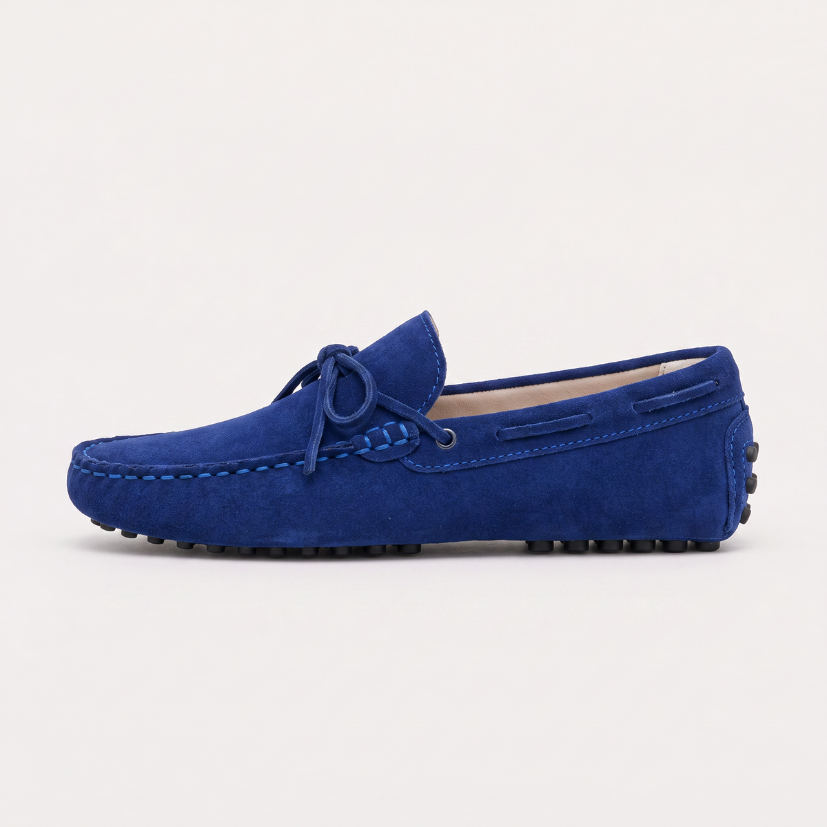 men's suede loafer with hand-stitched detail and front tie
